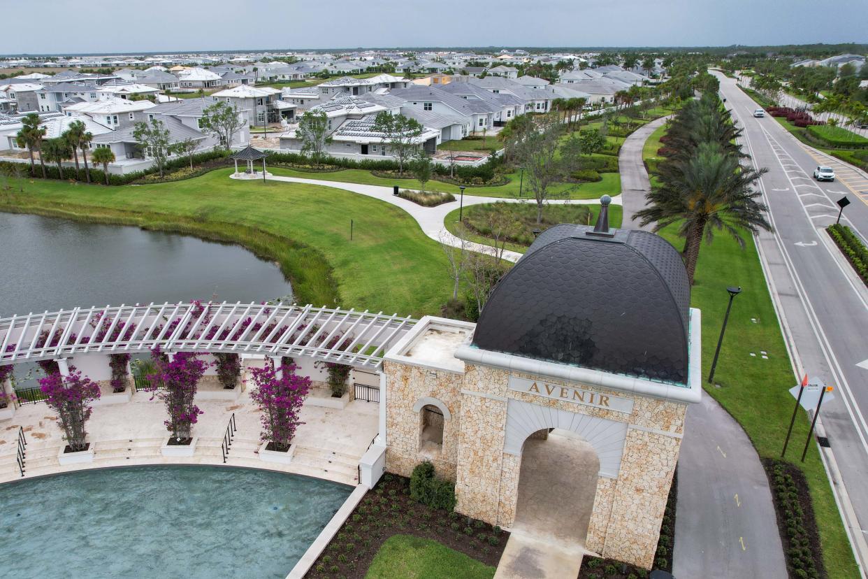 Architecture at the entrance of the Avenir community at the corner of Northlake Boulevard and Avenir Drive on Tuesday, April 11, in Palm Beach Gardens, Fla.