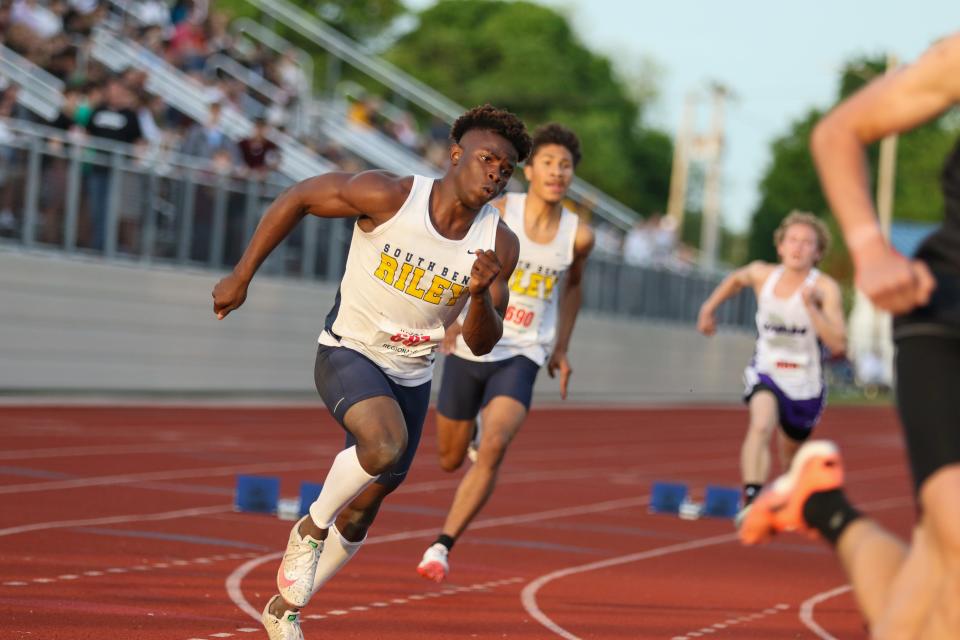 South Bend Riley’s Robert Nabieu competes in the 400 Meter Dash Thursday night during the Boys Track & Field Regional at Goshen High School.