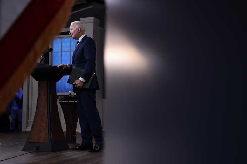 WASHINGTON, DC - DECEMBER 01: U.S. President Joe Biden listens to a reporter's question after finishing remarks on the economy and the high price of goods during the holidays at the Eisenhower Executive Office Building on December 01, 2021 in Washington, DC. Overall holiday sales are predicted to grow this year, according to the National Retail Federation, however supply chain issues and rising inflation continue to be areas of concern for the economy. (Photo by Anna Moneymaker/Getty Images)