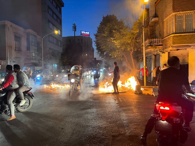 Iran has been torn by the biggest wave of social unrest in almost three years as Iranians including university students and young schoolgirls protest the death of 22-year-old Mahsa Amini in police custody. (Photo: AFP via Getty Images)