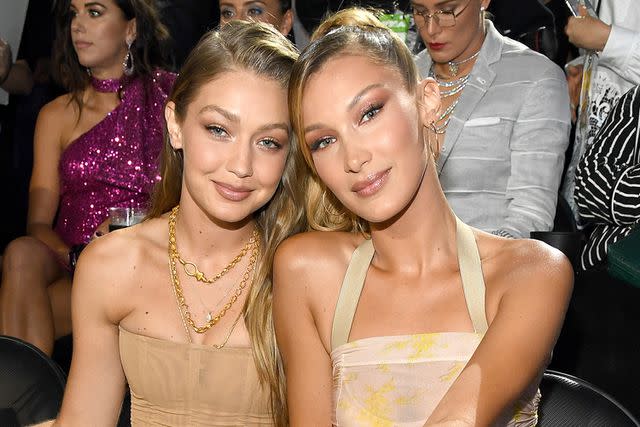 <p>Kevin Mazur/WireImage</p> Bella and Gigi Hadid attend the 2019 MTV Video Music Awards