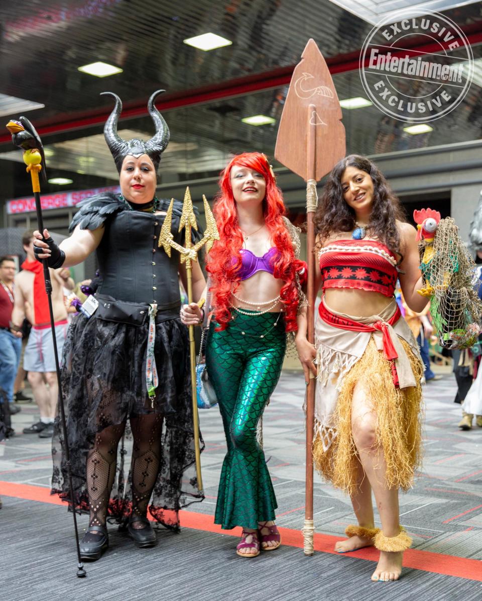 Maleficent from Maleficent , Ariel from The Little Mermaid, and Moana from Moana cosplayers