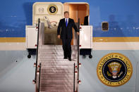 <p>President Donald Trump steps off his plane as he arrives at Paya Lebar Air Base in Singapore, ahead of a summit with North Korean leader Kim Jong Un, June 10, 2018. (Photo: Kim Kyung-Hoon/Reuters) </p>