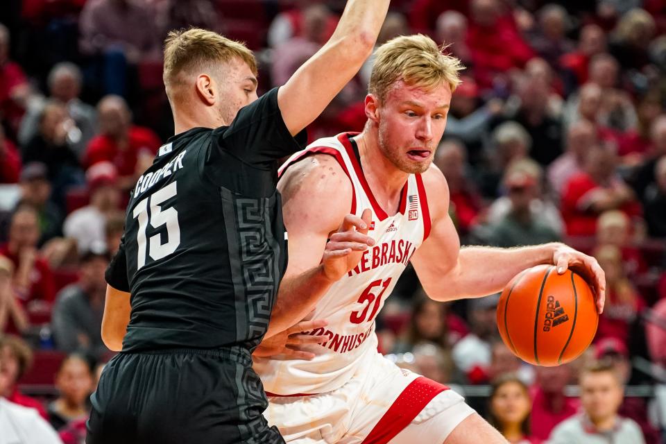 Nebraska Cornhuskers forward Rienk Mast (51) drives against Michigan State Spartans center Carson Cooper (15) during the first half at Pinnacle Bank Arena in Lincoln, Nebraska, on Sunday, Dec. 10, 2023.
