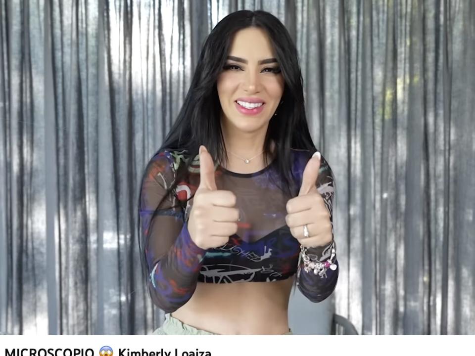 A screenshot from a recent Kimberly Loaiza video, where she's giving a thumbs up.