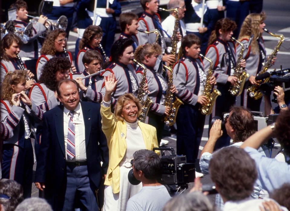 Native Tennessean Dinah Shore, center in yellow, waves to her fans as she arrives in her hometown of Winchester for a ceremony to rename one of its main streets "Dinah Shore Boulevard" on Aug. 21, 1989.