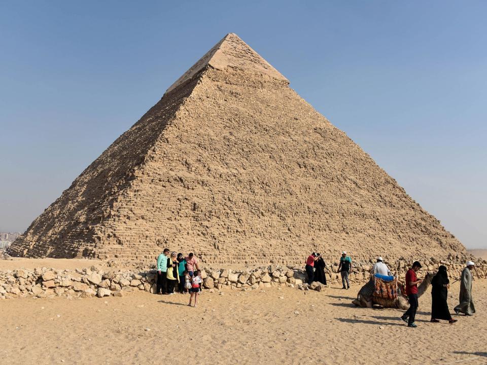 Tourists visit the Giza pyramids, on the southern outskirts of the Egyptian capital, Cairo: AFP/Getty