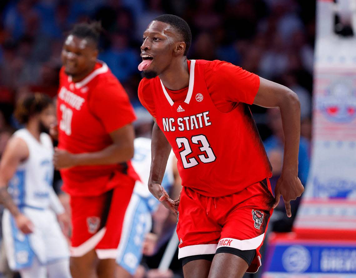 N.C. State’s Mohamed Diarra (23) celebrates making a three-pointer during the first half of N.C. State’s game against UNC in the championship game of the 2024 ACC Men’s Basketball Tournament at Capital One Arena in Washington, D.C., Saturday, March 16, 2024.