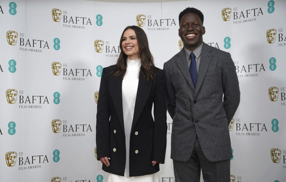 Actress Hayley Atwell, left and actor Toheeb Jimoh pose for a photo, during the nominations for the BAFTA Film Awards 2023, at BAFTA's headquarters in London, Thursday, Jan. 19, 2023. (Yui Mok/PA via AP)