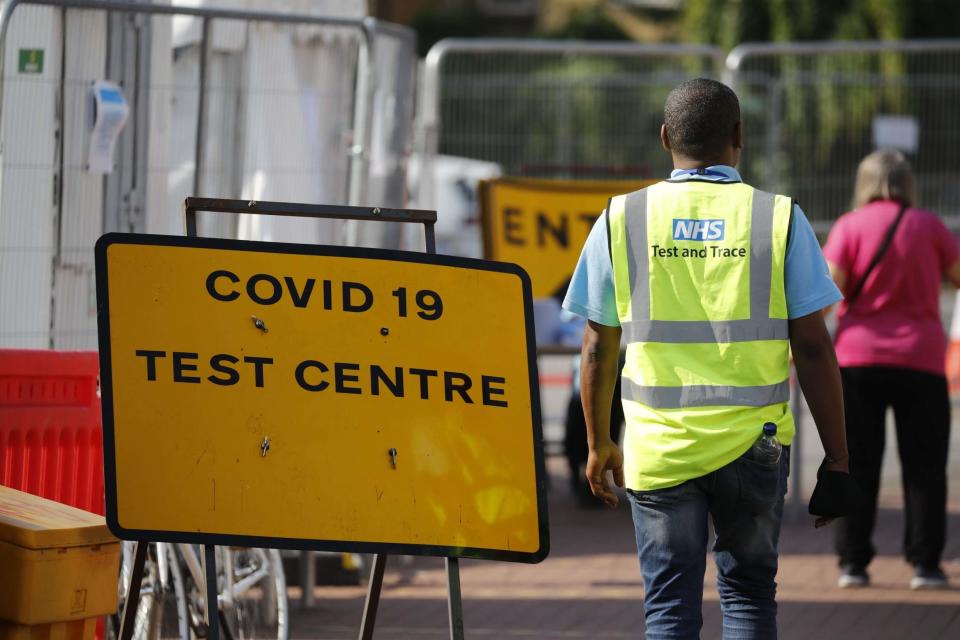 An employee working with NHS test and trace in north London (AFP via Getty Images)