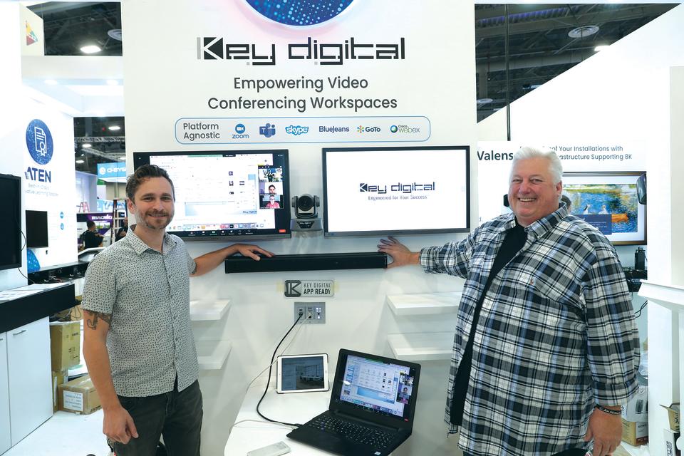 Two Key Digital vice presidents present at the InfoComm booth.