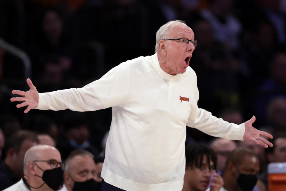 FILE - Syracuse head coach Jim Boeheim reacts against Villanova during the first half of an NCAA college basketball game in the Jimmy V Classic Tuesday, Dec. 7, 2021, in New York. Gone are the decades of scowls, railing against officials, getting in the face of players, snapping at reporters. Retirement is going just fine, thank you, for Jim Boeheim, who stepped down in March after 47 years of coaching the Orange.(AP Photo/Adam Hunger, File)