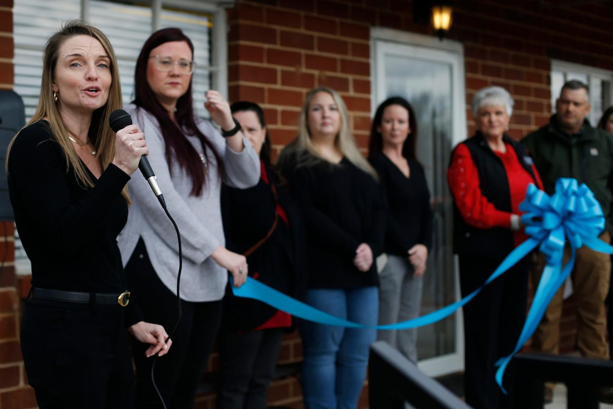 SANE Executive Director Michelle Dickens speaks to the crowd at the new Sexual Assault Nurse Examiners Bogart Family Protection Center in downtown Bogart, Ga., on Thursday, Jan. 26, 2023.