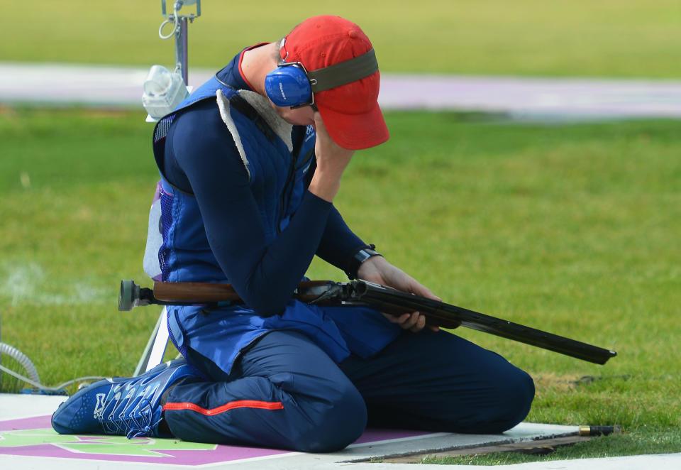 LONDON, ENGLAND - AUGUST 02: Peter Robert Russel Wilson of Great Britain celebrates winning the gold medal in the Men's Double Trap Shooting final on Day 6 of the London 2012 Olympic Games at The Royal Artillery Barracks on August 2, 2012 in London, England. (Photo by Lars Baron/Getty Images)