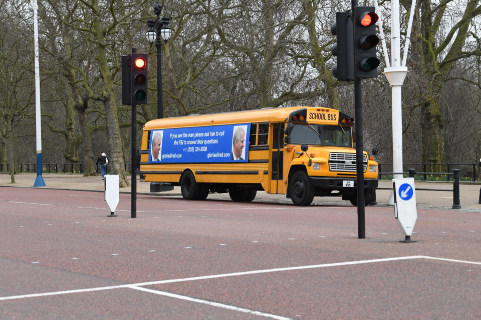 A yellwo school bus with a post-birthday message for the Duke of York, from US lawyer Gloria Allred, driving along The Mall towards Buckingham Palace, London. Ms Allred, who represents five of the victims of Jeffrey Epstein, has been critical of the Duke for not speaking with the FBI about his former friend Epstein.