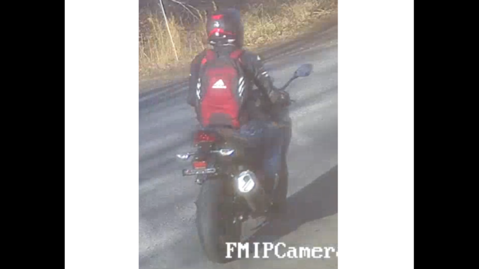 School bus video shows this motorcyclist nearly hitting a boy while the bus was stopped on Carlyle Road in Iredell County and had its red flashing lights on Thursday afternoon, Jan. 4, 2003. 