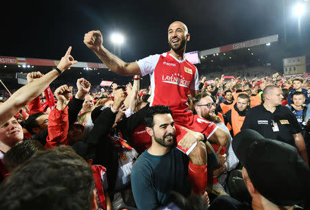 Soccer Football - Bundesliga Relegation Playoff - Union Berlin v VfB Stuttgart - Stadion An der Alten Forsterei, Berlin, Germany - May 27, 2019 Union Berlin's Akaki Gogia celebrates after winning the match REUTERS/Annegret Hilse DFL regulations prohibit any use of photographs as image sequences and/or quasi-video