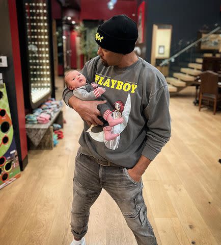 <p>Shemar Moore Instagram</p> Shemar Moore holding his daughter Frankie as a newborn