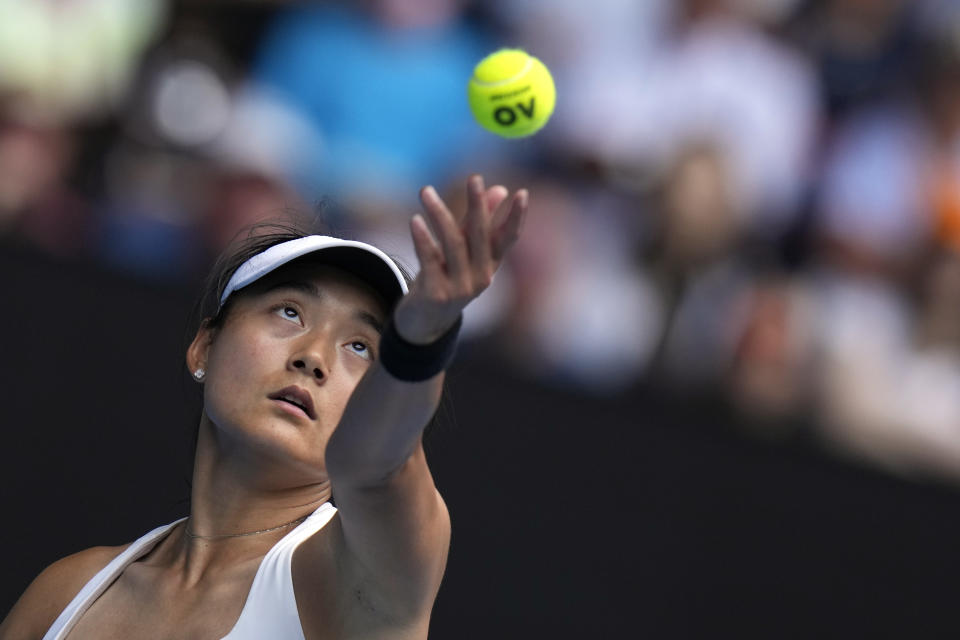 Wang Yafan of China serves to compatriot Zheng Qinwen during their third round match at the Australian Open tennis championships at Melbourne Park, Melbourne, Australia, Saturday, Jan. 20, 2024. (AP Photo/Andy Wong)