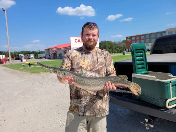 Parsons man reels in new state record with spotted gar catch