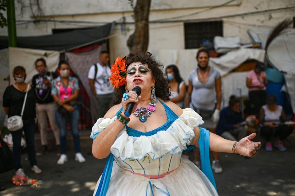 <p>LGBTQ+ activist Sara Lugo or Lucha Villa performs in support of a programmd created by members of the LGBTQ+ community to give free meals to homeless people amid the pandemic, during the celebration of gay pride in Mexico City.</p>