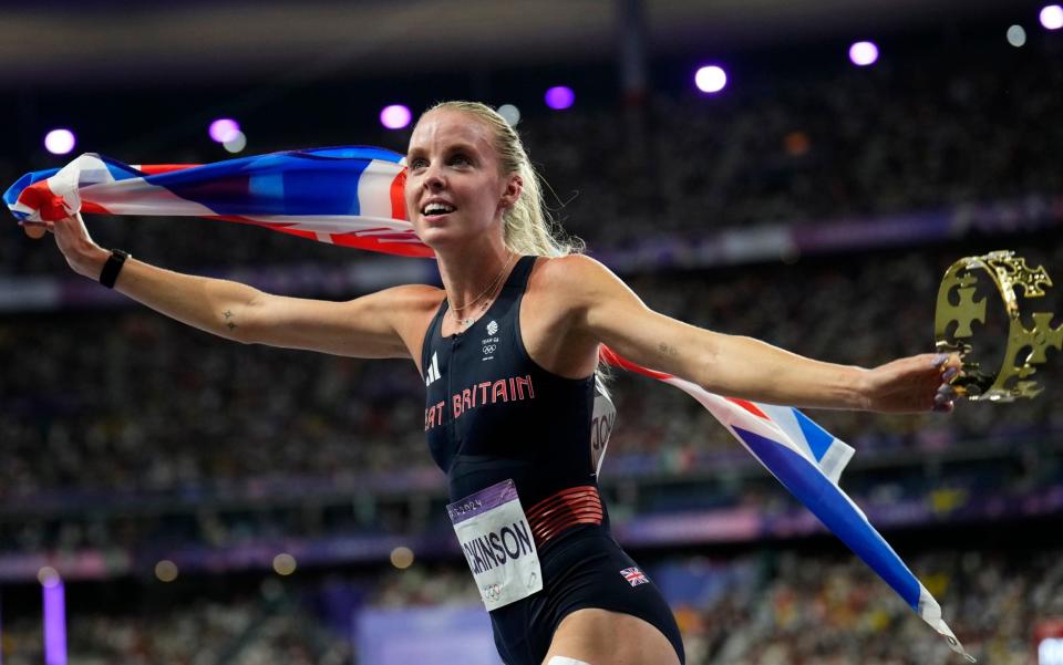 Keely Hodgkinson, of Britain, celebrates after winning the women's 800-meters final at the 2024 Summer Olympics, Monday, Aug. 5, 2024, in Saint-Denis, France.