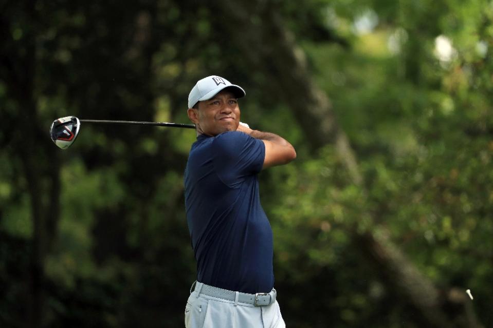 Tiger Woods on the way to a birdie at the second hole in the first round of the Masters at Augusta National (AFP)