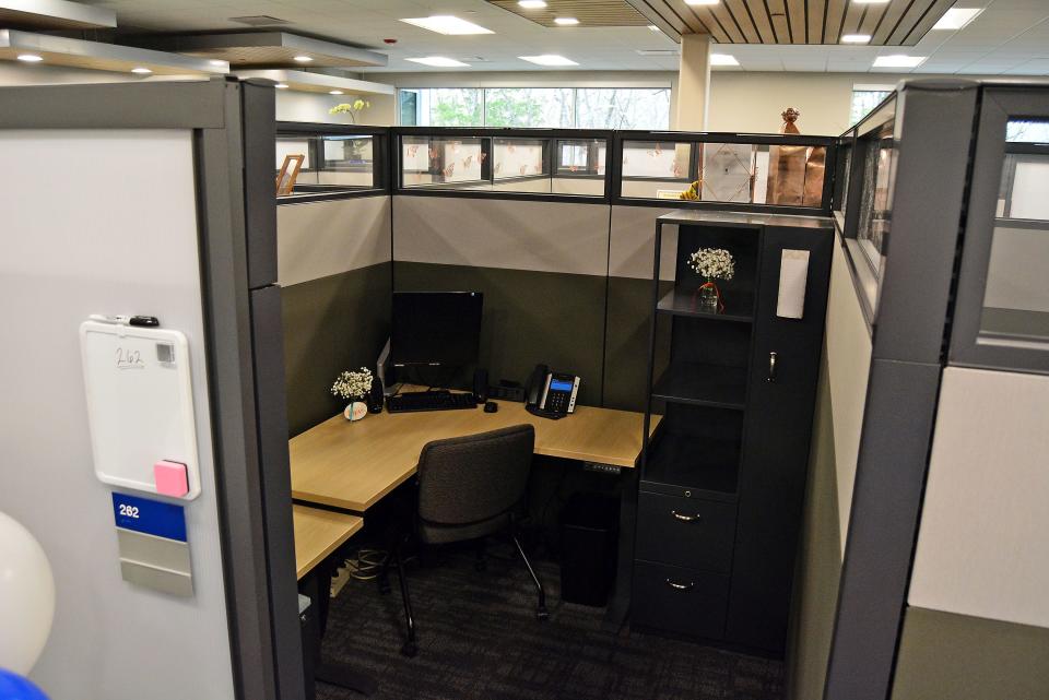 One of several cubicle office spaces at the new location of Boone County Family Resources on West Ash Street. Each cubicle has a sliding door, and white noise generators in the ceiling help with privacy.