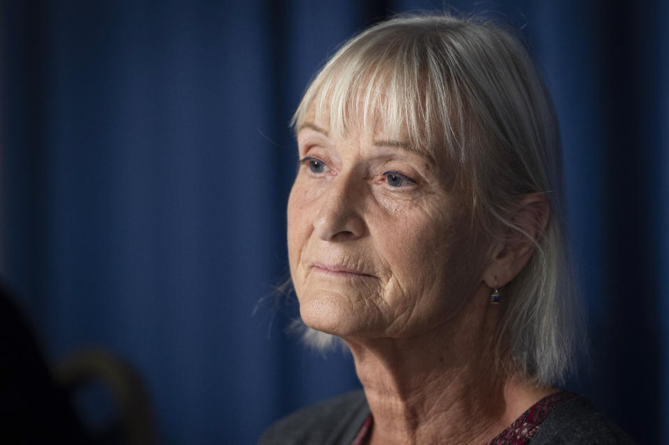 FILE - Els Woodke speaks about the 2016 kidnapping of her husband Jeff Woodke in West Africa, during a news conference in Washington, Nov. 17, 2021. The Biden administration says the American aid worker who was kidnapped in Niger six years ago has been released from custody. Jeffrey Woodke was kidnapped from his home in Abalak, Niger, in October 2016 by men who ambushed and killed his guards and forced him at gunpoint into their truck, where he was driven north toward Mali’s border. (AP Photo/Cliff Owen, File)