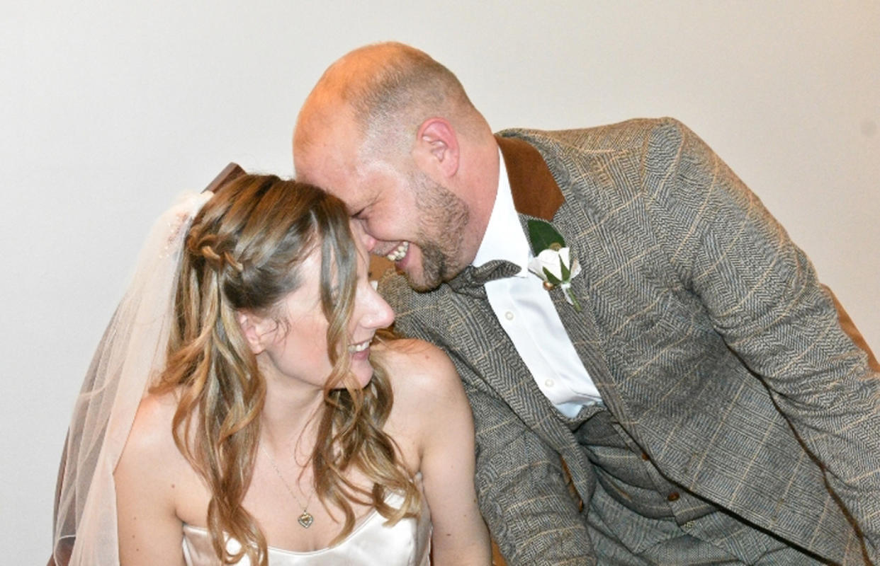 Sarah Beale, 36, used her hair to cover her face on her wedding day. (PA Real Life/ Divina Vyas)