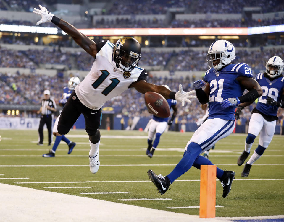 <p>Jacksonville Jaguars wide receiver Marqise Lee (11) looses the ball out-of-bounds after a catch in front of Indianapolis Colts cornerback Vontae Davis (21) during the first half NFL football game in Indianapolis, Sunday, Oct. 22, 2017. (AP Photo/Jeff Roberson) </p>