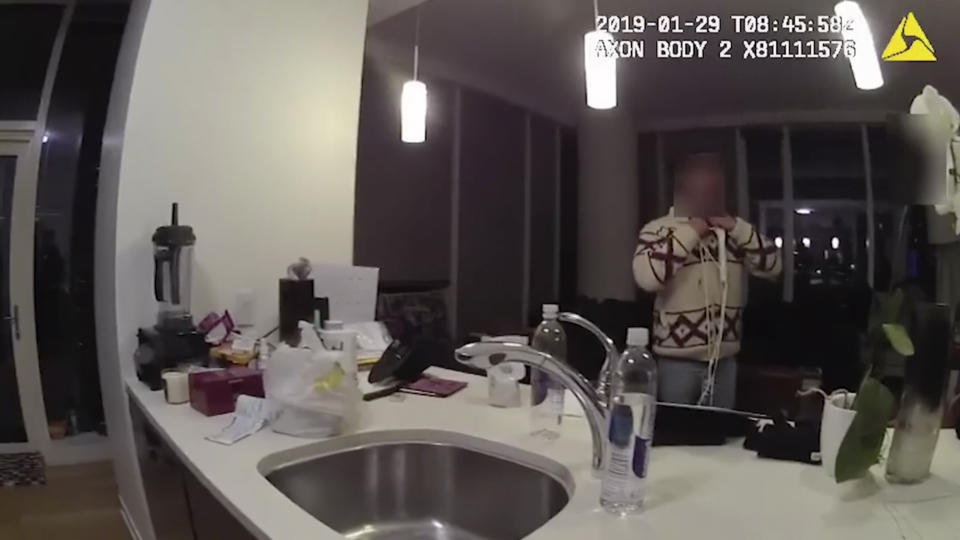 This Jan. 29, 2019, image made from police body cam video provided by the Chicago Police Department purports to show Jussie Smollett, with a white rope wrapped around his neck, talking with police officers in his apartment in Chicago. Chicago police on Monday, June 24, released hundreds of files from the investigation into Smollett's claim he was attacked by two men, including releasing the video footage for the first time of the "Empire" actor wearing the thin white rope wrapped around his neck that he told detectives was a noose. The footage from the Chicago police blurred out Smollett's face because, police explained, he was considered a victim at that point. (Chicago Police Department via AP)