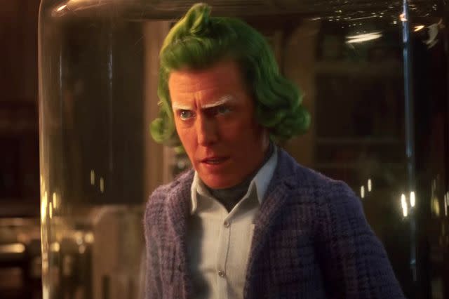 <p>Warner Bros./Courtesy Everett Collection</p> Hugh Grant as an Oompa Loompa in "Wonka" (2023).