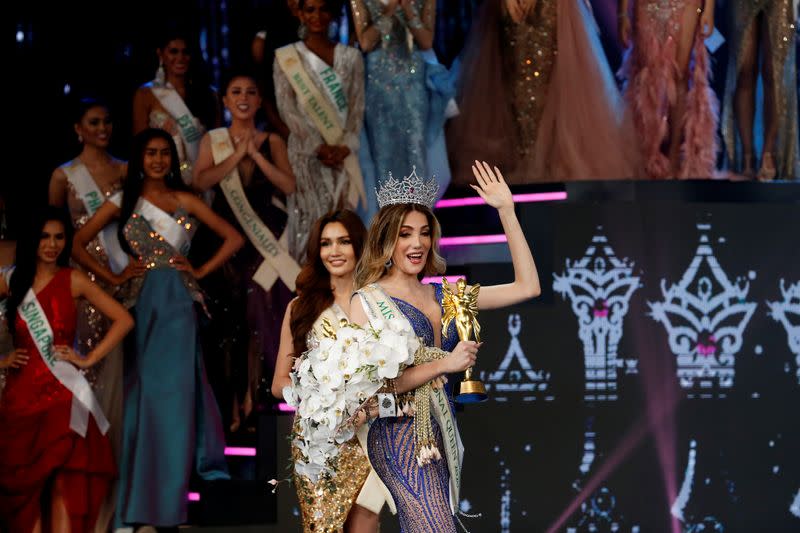 Mexico's Valentina Fluchaire waves after winning crown at the final show of the Miss International Queen 2020 transgender beauty pageant in Pattaya