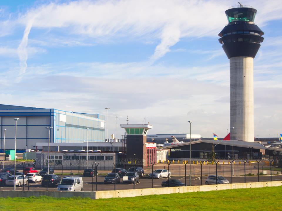 Control tower and terminal buildings at Manchester International Airport, UK.