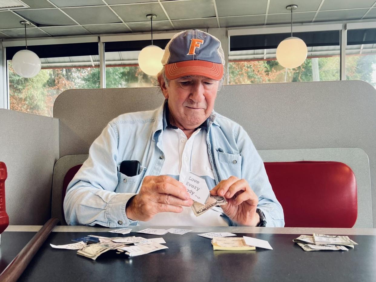 Waffle House Man Giving Out Money