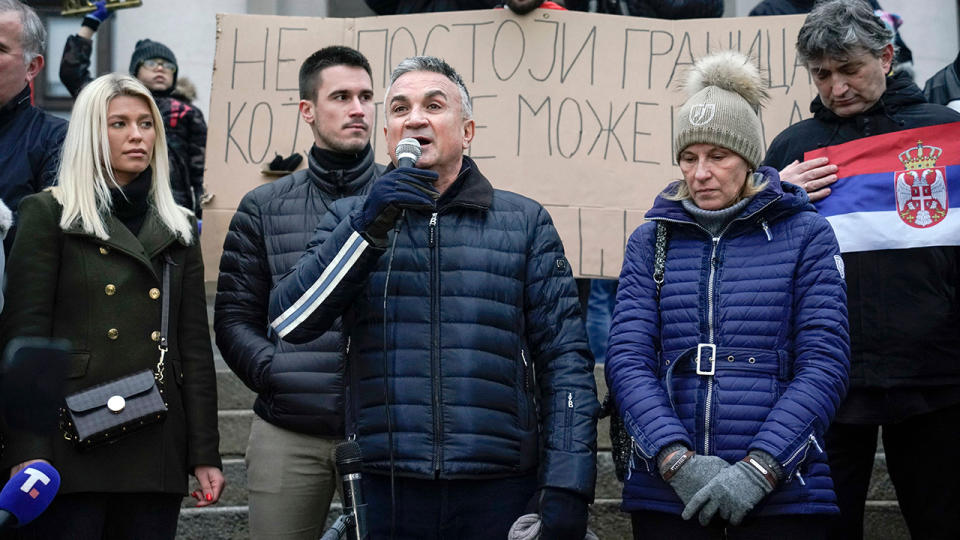 Novak Djokovic's father Srdjan, pictured here at a rally in front of Serbia's National Assembly.