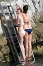 Kirsten Dunst photographed taking a dip off the rocky coast at the Hotel du Cap Eden Roc in Cap d'Antibes, France