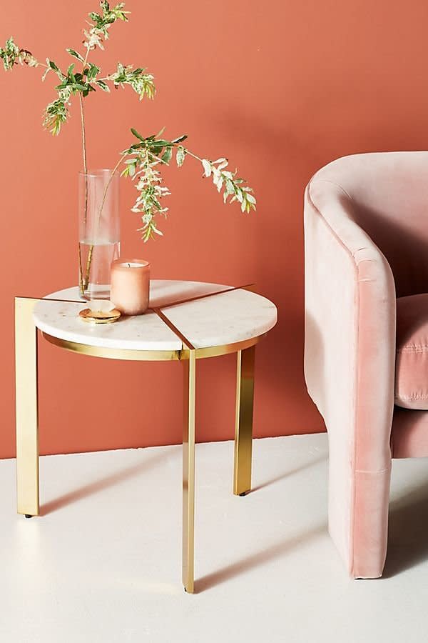 Get it at <a href="https://www.anthropologie.com/shop/sectored-marble-side-table?category=Furniture&amp;color=010&amp;quantity=1&amp;size=One%20Size&amp;type=REGULAR" target="_blank" rel="noopener noreferrer">Anthropologie</a>, $298.&nbsp;