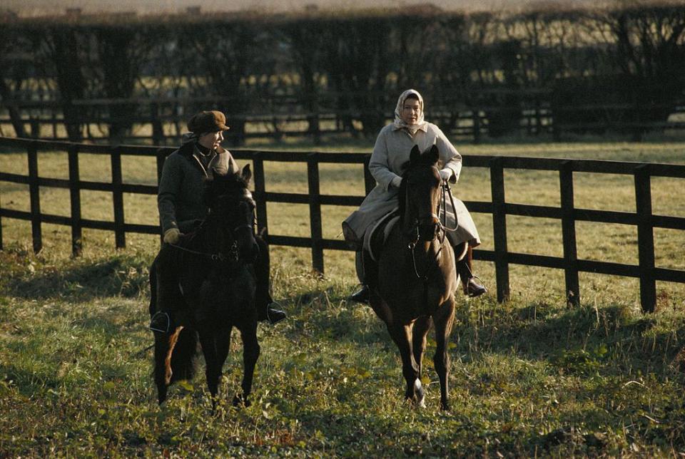 <p>Princess Anne and Queen Elizabeth II go for a horse ride on the grounds of the Sandringham estate. </p>