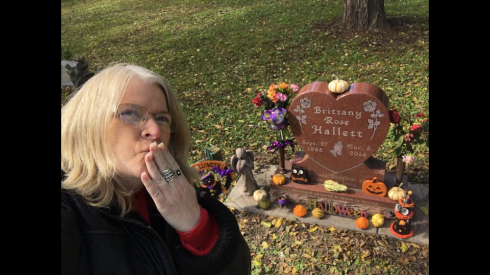 Jenny Hallett is shown at the grave of her daughter, Brittany Rose, whose death was alcohol-induced.