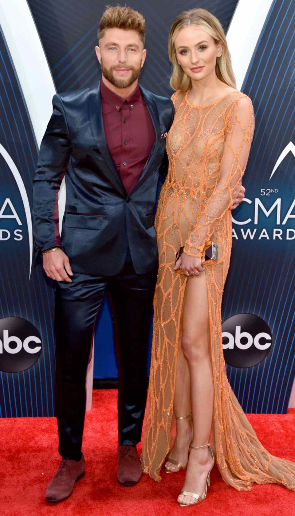 Chris Lane and Lauren Bushnell attend the 52nd annual CMA Awards at the Bridgestone Arena on November 14, 2018 in Nashville, Tennessee