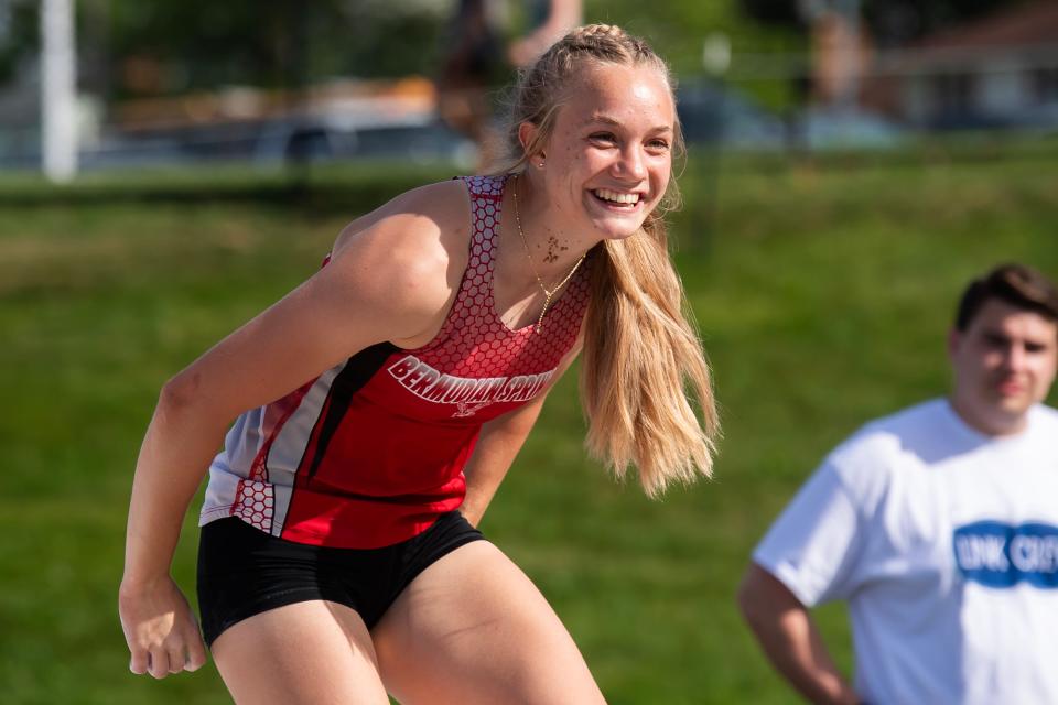 Bermudian Springs junior Lily Carlson smiles after clearing 12' 3" in the pole vault competition during the YAIAA Track and Field Championships at Dallastown Area High School on May 8, 2024.