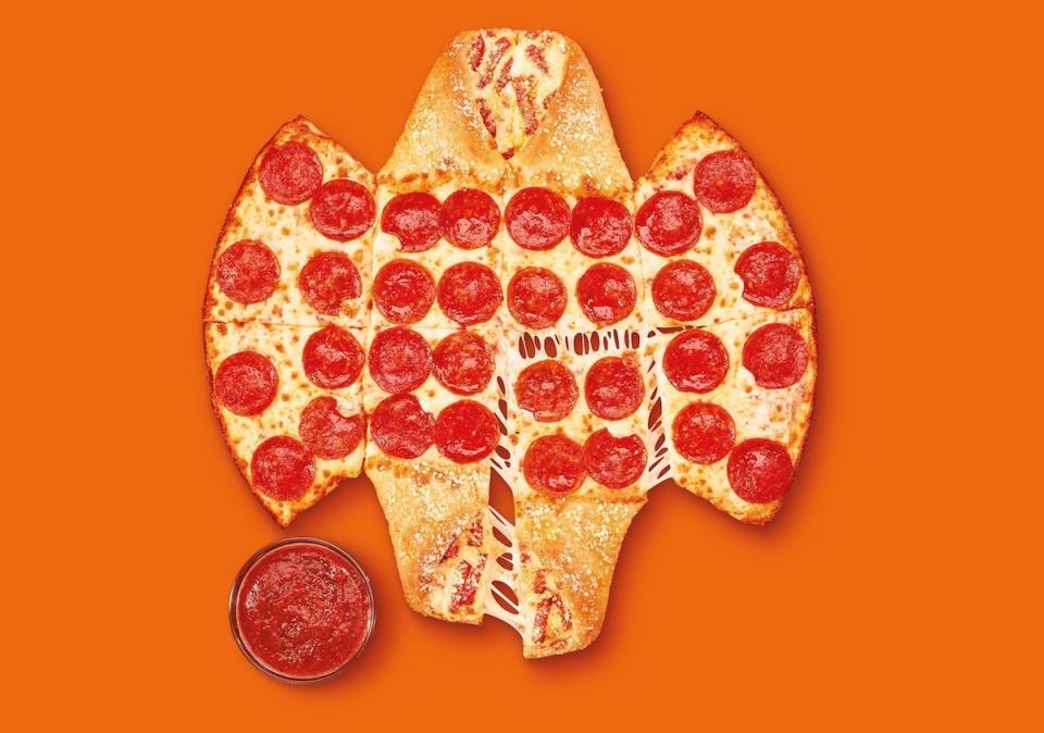 Little Caesars pizza/calzone combo The Batman Calzony shaped to look like a bat (though it actually looks more like the outline of an eagle)