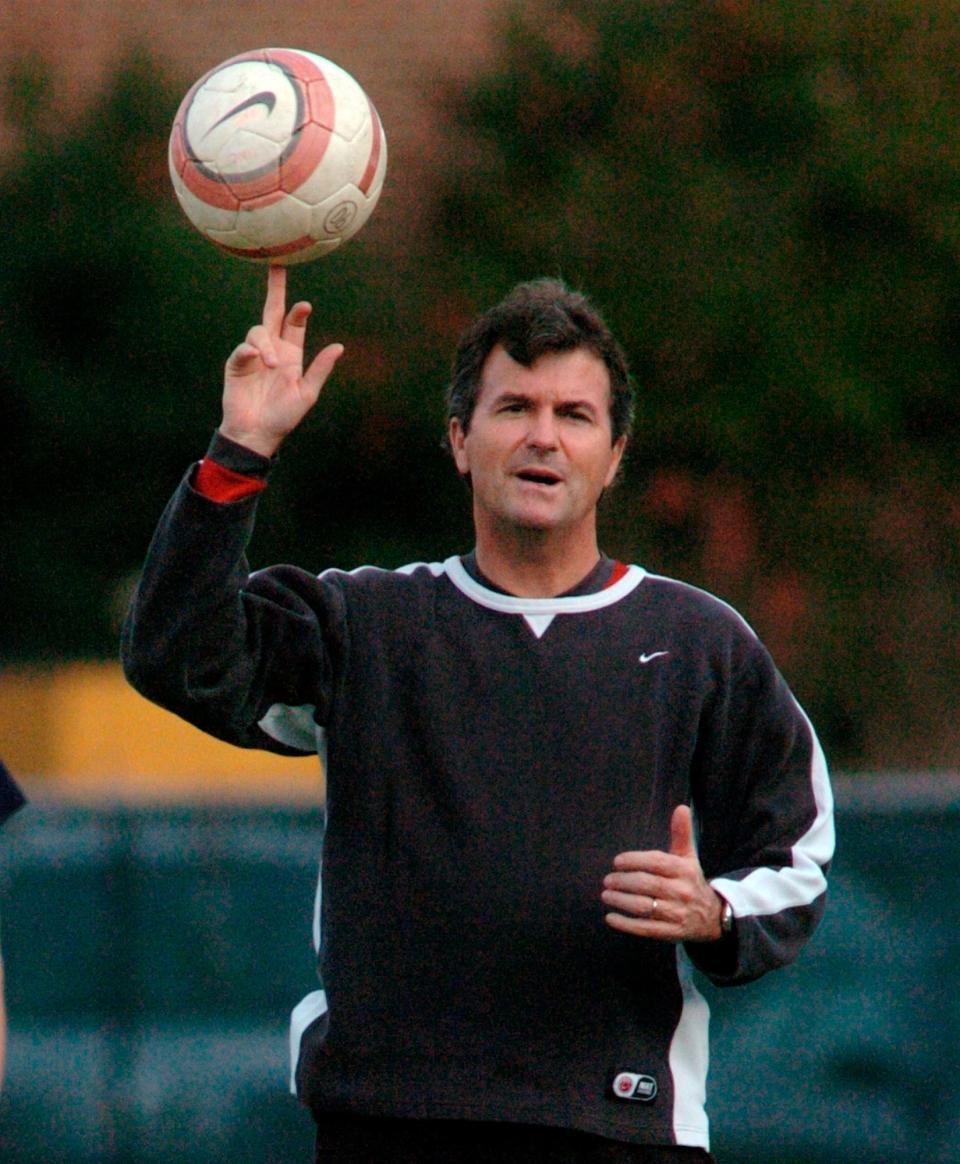 University of North Carolina NCAA college women's soccer coach Anson Dorrance spins a soccer ball on his finger during practice, in this 2006 photo. Hall of Fame coach Anson Dorrance is embarking on what amounts to a continuation of the 2020 women's soccer season with North Carolina, having already played for the ACC championship. (The News & Observer via AP)