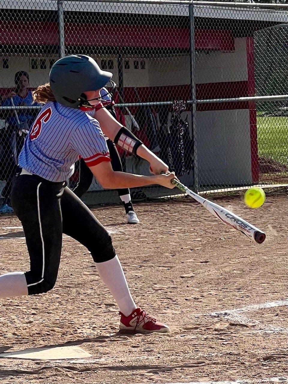 Ridgedale's Lilly Ruth connects for a home run during Tuesday's Northwest Central Conference home softball game against North Baltimore. Ridgedale won 14-4 in five innings.