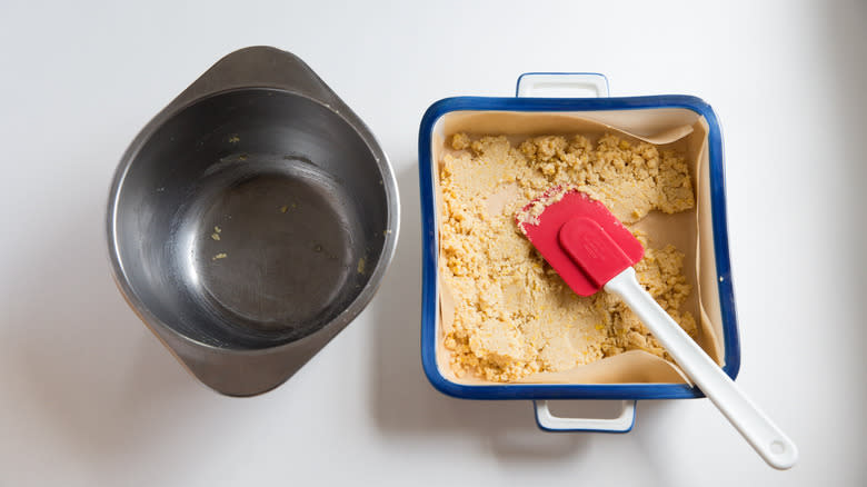 spreading pie crust in pan