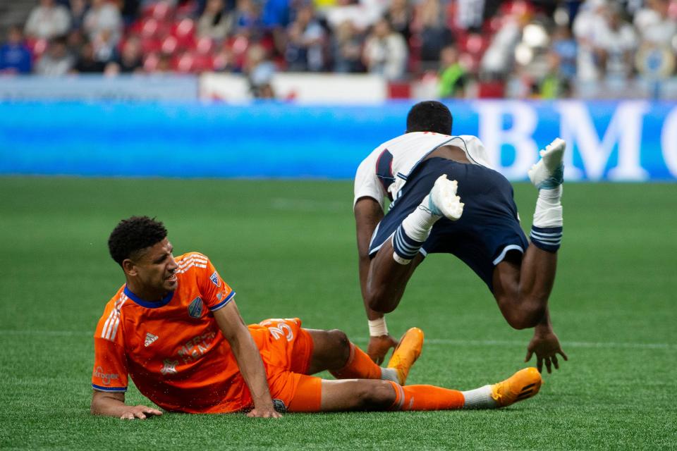 Jun 10, 2023; Vancouver, British Columbia, CAN;  Vancouver Whitecaps FC forward Sergio Cordova (9) challenges FC Cincinnati defender Ian Murphy (32) during the second half at BC Place.