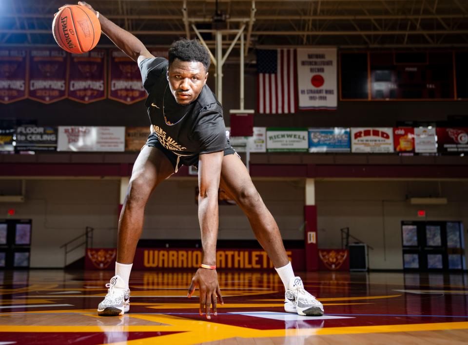 Chris Mpaka stands for a photo before basketball practice at Indian Hills Community College in Ottumwa on Oct. 24. He grew up in impoverished conditions but now has dreams of playing Division I basketball and maybe even the NBA.