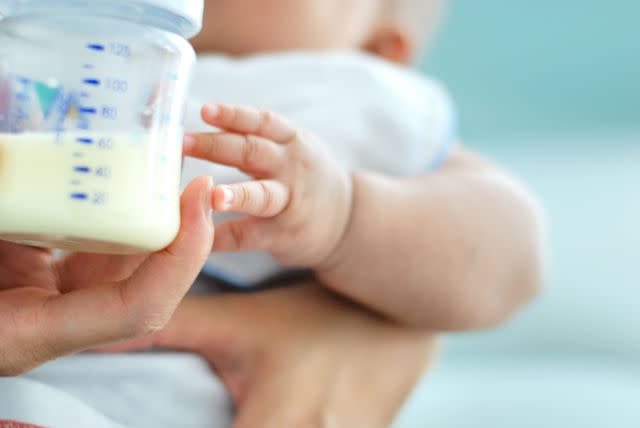 dapan photography/Moment/Getty Images Stock photo of a baby with a bottle